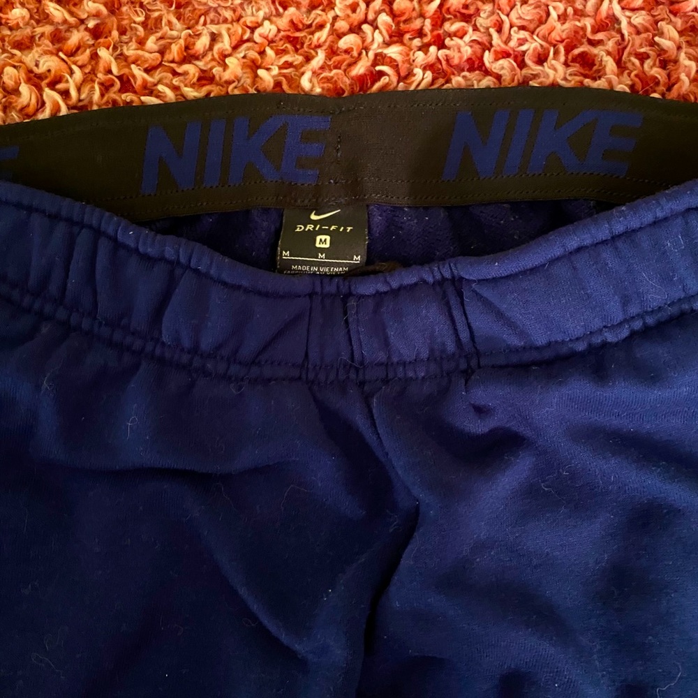 navy blue men’s nike sweatpants w the jogger ankle